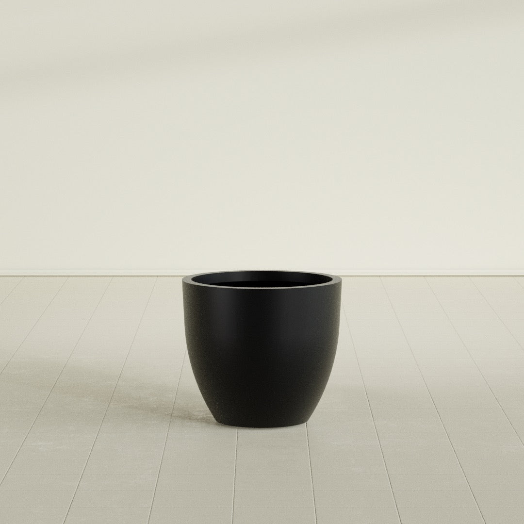 Wannsee Round Planter in Matte Black, 27"D × 24"H, shown empty