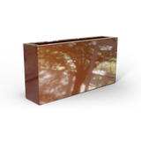 Camoux narrow fiberglass planter in Metallic Bronze, 36 × 8 × 18 in, studio render
