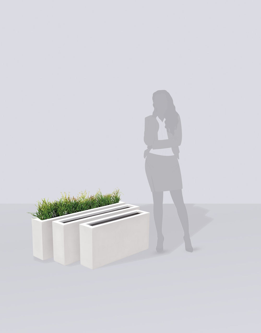 Camoux Narrow Rectangular fiberglass planter size range shown to scale beside a standing figure