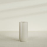 Saint Tropez Bullet Round Planter in Satin Beige, 24"D × 50"H, shown empty