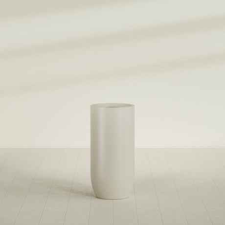 Saint Tropez Bullet Round Planter in Satin Beige, 24"D × 50"H, shown empty
