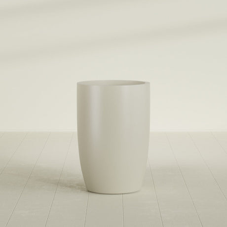 Lisbon tall round tapered fiberglass planter in Satin Beige, 24 in diameter, 36 in high, shown empty