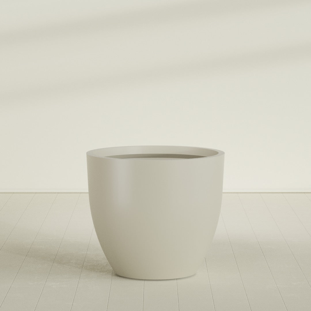Wannsee Round Planter in Satin Beige, 50"D × 44"H, shown empty