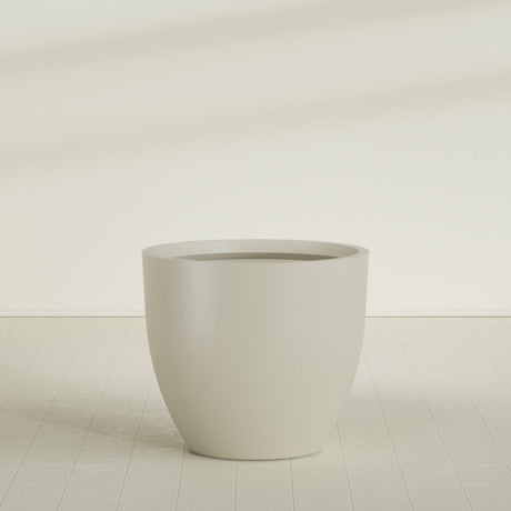 Wannsee Round Planter in Satin Beige, 50"D × 44"H, shown empty