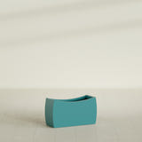 Seoul Curved Planter in Satin Seafoam Green, 32"L × 12"D × 18"H, shown empty