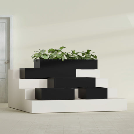 Antwerp Rectangular fiberglass planter in Matte Black, size range, in a sunlit interior