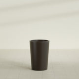 Tegel Round Tapered Planter in Matte Dark Brown, 18"D × 26"H, shown empty