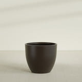 Wannsee Round Planter in Matte Dark Brown, 44"D × 39"H, shown empty
