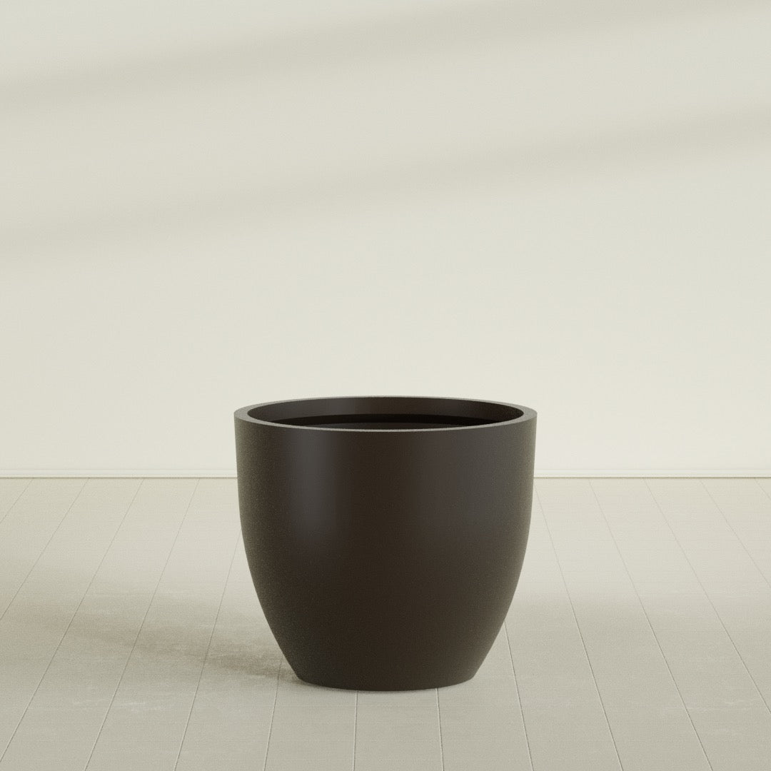Wannsee Round Planter in Matte Dark Brown, 44"D × 39"H, shown empty