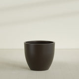 Wannsee Round Planter in Matte Dark Brown, 44"D × 39"H, shown empty