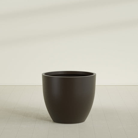 Wannsee Round Planter in Matte Dark Brown, 44"D × 39"H, shown empty