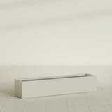 Cuba Low Rectangular Planter in Satin Beige, 60"L × 14"D × 12"H, shown empty