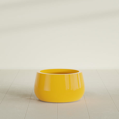 Short Hayden Bowl Planter in Gloss Saffron, 16"D × 8"H, shown empty