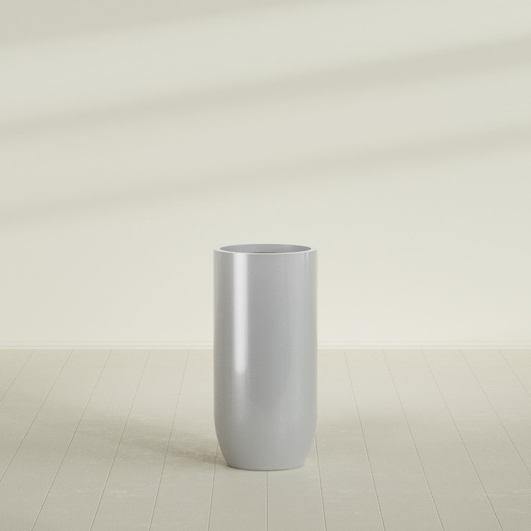 Saint Tropez Bullet Round Planter in Metallic Silver, 24"D × 50"H, shown empty