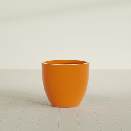 Wannsee Round Planter in Gloss Tangerine, 33"D × 29"H, shown empty