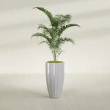 San Jose Tall Fluted fiberglass planter in Metallic Silver, shown planted, in a sunlit interior