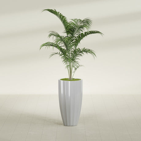 San Jose Tall Fluted fiberglass planter in Metallic Silver, shown planted, in a sunlit interior