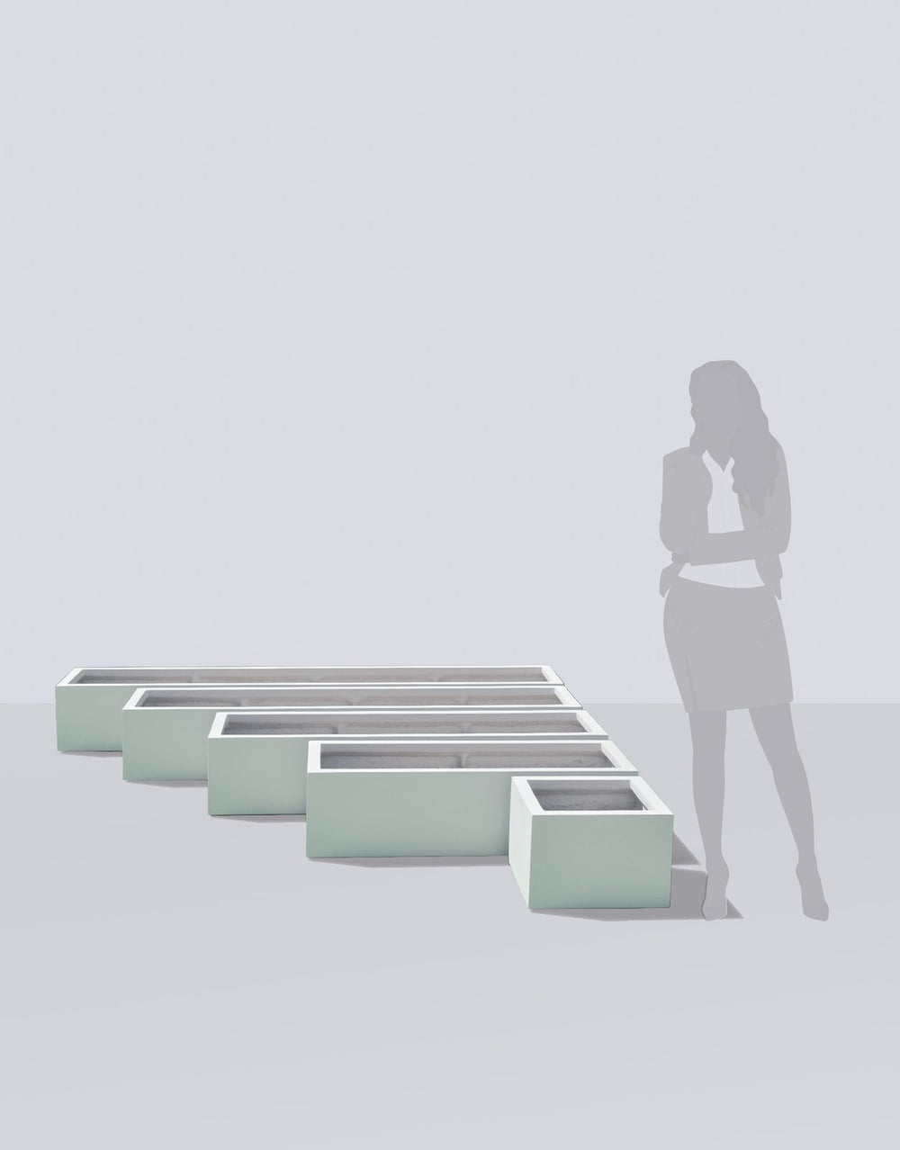 Cuba Low Rectangular fiberglass planter size range shown to scale beside a standing figure
