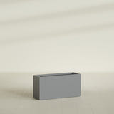 Hollywood Narrow Rectangular Planter in Matte Gunmetal, 36"L × 12"D × 24"H, shown empty