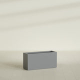 Hollywood Narrow Rectangular Planter in Matte Gunmetal, 36"L × 12"D × 24"H, shown empty