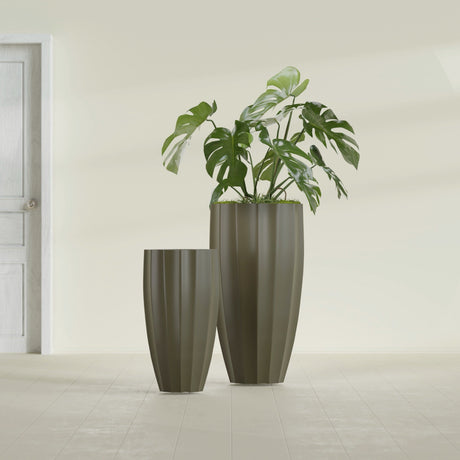 San Jose Tall Fluted fiberglass planter in Matte Bronze, size range, in a sunlit interior