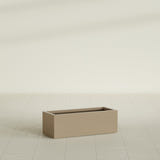 Cuba Low Rectangular Planter in Gloss Metallic Gold, 36"L × 14"D × 12"H, shown empty