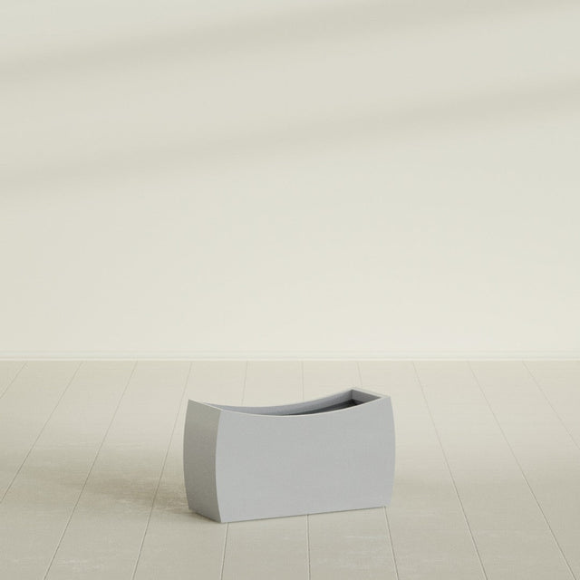 Seoul Curved Planter in Metallic Silver, 32"L × 12"D × 18"H, shown empty