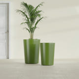 Tegel Round Tapered fiberglass planter in Satin Green, size range, in a sunlit interior