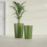 Tegel Round Tapered fiberglass planter in Satin Green, size range, in a sunlit interior