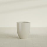Valencia Tapered Round Planter in Satin Beige, 20"D × 23"H, shown empty
