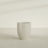 Valencia Tapered Round Planter in Satin Beige, 20"D × 23"H, shown empty