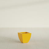 Lima Tapered Square Planter in Gloss Saffron, 12", shown empty