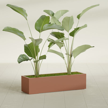 Cuba Corner fiberglass planter in Matte Terra Cotta, shown planted, in a sunlit interior