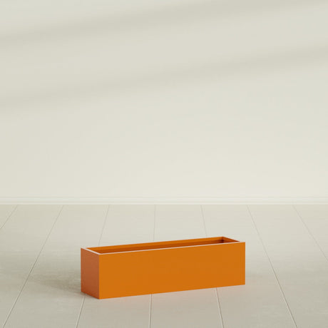 Monaco Rectangle Planter in Gloss Tangerine, 26"L, shown empty