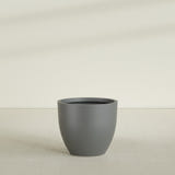 Wannsee Round Planter in Matte Gunmetal, 39"D × 34"H, shown empty
