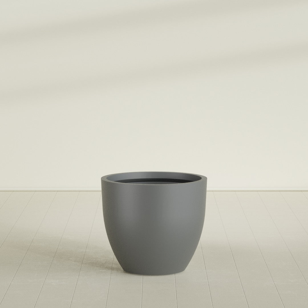 Wannsee Round Planter in Matte Gunmetal, 39"D × 34"H, shown empty