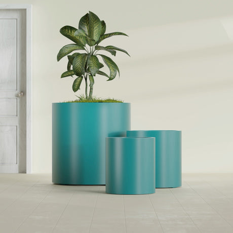 Rio Grande Cylinder fiberglass planter in Satin Seafoam Green, size range, in a sunlit interior
