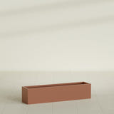 Monaco Rectangle Planter in Matte Terra Cotta, 32"L, shown empty