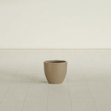 Wannsee Round Planter in Gloss Metallic Gold, 15"D × 13"H, shown empty