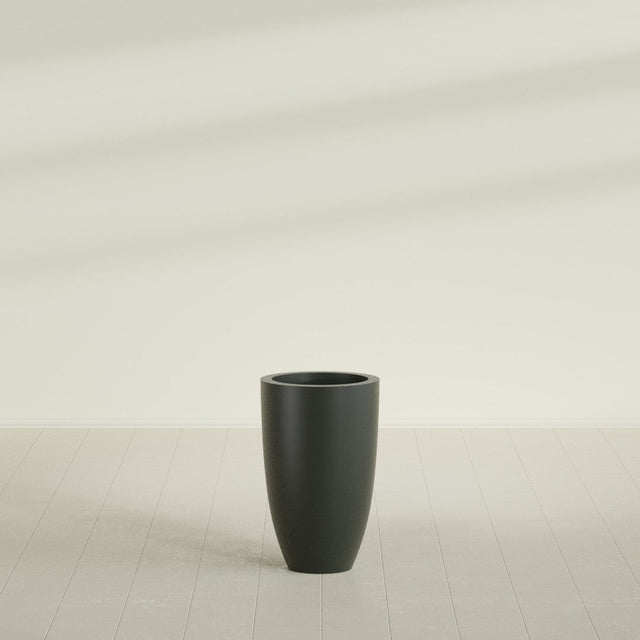 Brannan Tapered Round Planter in Matte Charcoal, 18"D × 29"H, shown empty