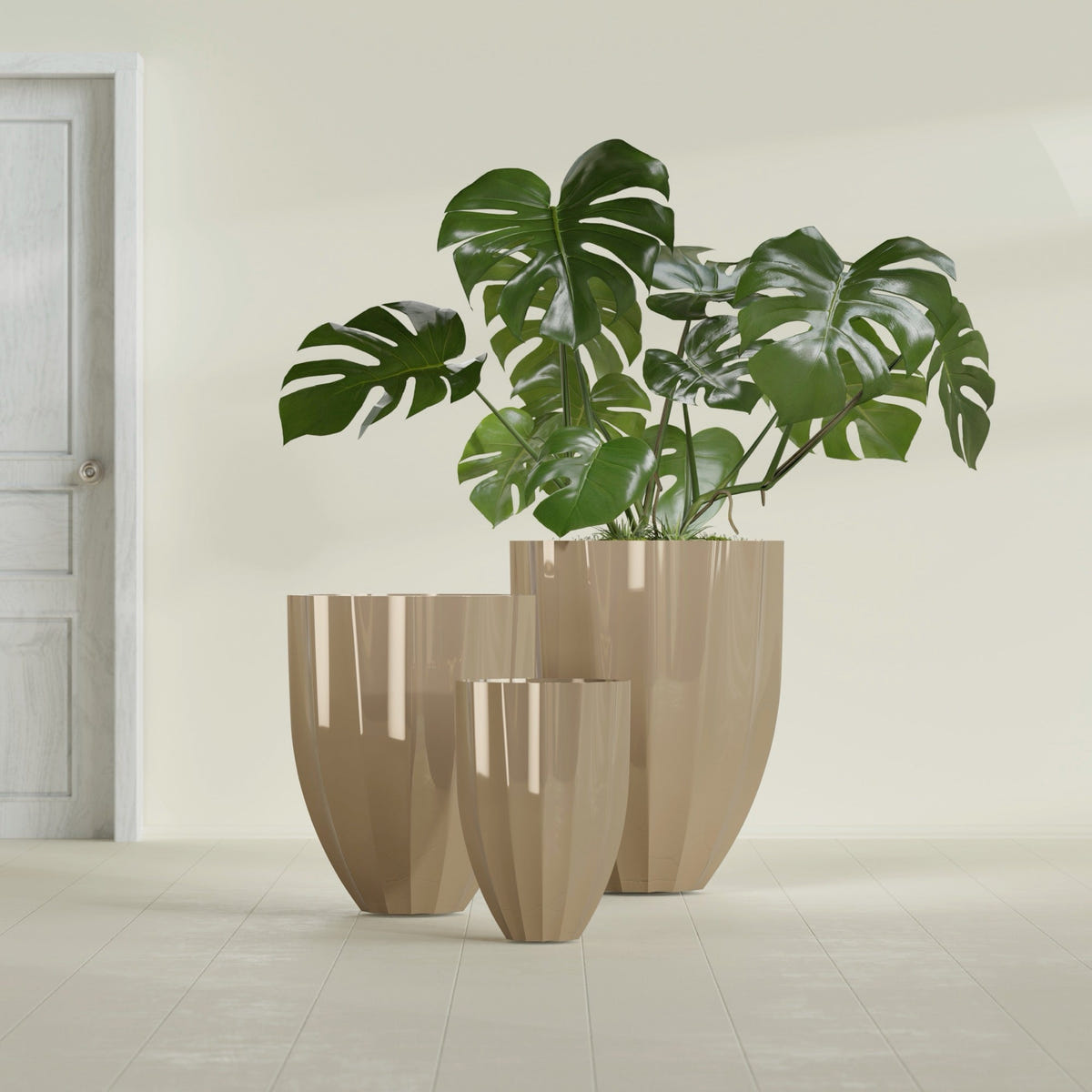 Alicante Fluted fiberglass planter in Gloss Metallic Gold, size range, in a sunlit interior