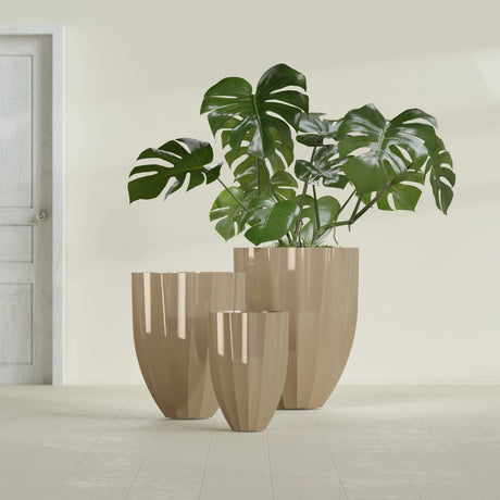 Alicante Fluted fiberglass planter in Gloss Metallic Gold, size range, in a sunlit interior