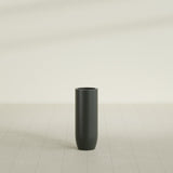 Saint Tropez Bullet Round Planter in Matte Charcoal, 12"D × 32"H, shown empty