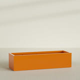 Torino Wide Rectangular Planter in Gloss Tangerine, 72"L × 24"D × 18"H, shown empty
