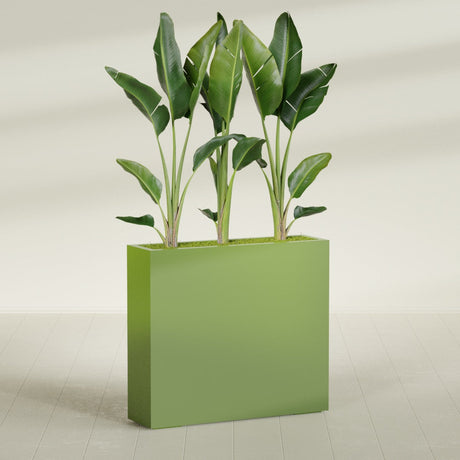 Amesbury Narrow Rectangular fiberglass planter in Satin Green, shown planted, in a sunlit interior