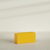 Hollywood Narrow Rectangular Planter in Gloss Saffron, 36"L × 12"D × 24"H, shown empty
