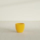 Wannsee Round Planter in Gloss Saffron, 22"D × 19"H, shown empty