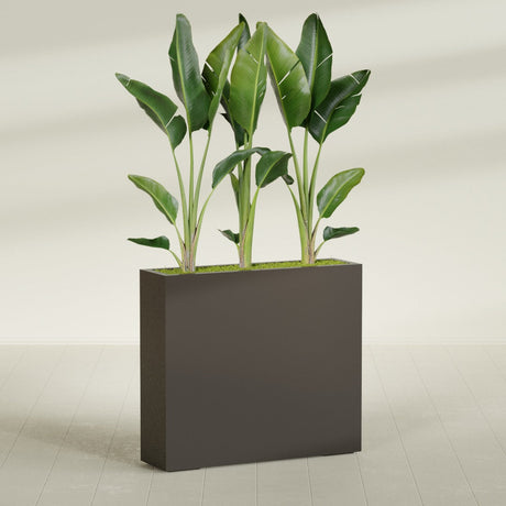 Amesbury Narrow Rectangular fiberglass planter in Matte Dark Brown, shown planted, in a sunlit interior