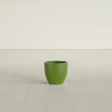 Wannsee Round Planter in Satin Green, 15"D × 13"H, shown empty