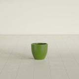Wannsee Round Planter in Satin Green, 15"D × 13"H, shown empty